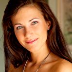 Third pic of Lusty brunette angel of seduction Lauren Lace is showing off and posing on cam.