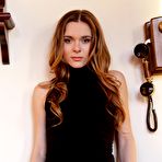 First pic of Gorgeous teen Dana P is slowly releasing her body off dress and posing in black stockings