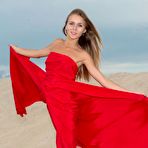 First pic of Girl in wonderful red outfit Dana P is flashing her delicious full boobs and shaved beaver