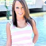 Third pic of Naughty chick Hayley Hanes playfully spreads her buttocks and pussy outdoors