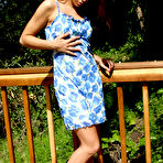 First pic of Sarah Blake with tiny ass and hairless pussy removes her blue dress and white panties outdoors