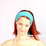 Fourth pic of Bare tit redhead Gabina Nubiles shows her pussy in panty and without it