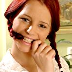 First pic of The slutty redhead chick Piper Fawn stripping and masturbating shaved pussy at the working place