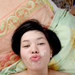 Fourth pic of Mixed race Amerasian girl goes all the way with wild sex.