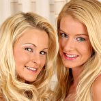 First pic of Completely cute lesbian blondes Nikki Sun and Natalli Di Rossa stretch their anuses with dildos
