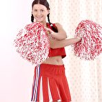 First pic of Pigtailed cheerleader Jessica Fiorentino has fun and stuffs her slit by orange dildo.