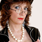 Fourth pic of Well-stacked middle-aged model Lady Sonia loves uniform, leather and latex