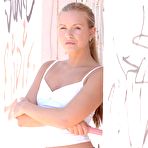 First pic of Lifting her short, plaid skirt high on her hips, a bare ass shows Heather Lightspeed is a sexy girl