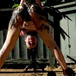 Second pic of SexPreviews - Abigail Annalee is bound in metal her naked body covered in mud