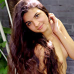 Fourth pic of Connie portrays a sweet and cute garden nymph with her long, wavy brown hair, naturally beautiful face without any hint of makeup, and an exquisite body with womanly curves.