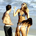 Second pic of Busty Rachel Uchitel cleavage and cameltoe in bikini on the beach