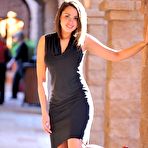 Third pic of Immaculate lady Paige FTV in elegant black dress flashes her shapely tits and slit