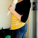 First pic of Dark haired teen girl Myra FTV with playful smile shows her nipples at home