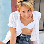 Fourth pic of Sexy dressed teen Tina FTV in mini skirt pulls her panties aside and takes dildo on the roof