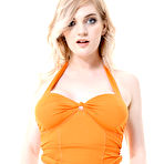 Second pic of Hot blonde Carly Rae in her orange clothes and white boots