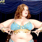 First pic of Sexy dressed fat woman Miss Isabelle with big breasts gets naked and displays her meaty snatch