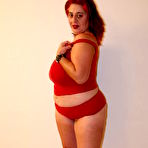 First pic of Fat redhead Tanya Tung takes black schlong after stripping out of her red lingerie