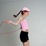 First pic of Sexy legged redhead Eletra Angels does exercises in uniform before riding cock in the nude