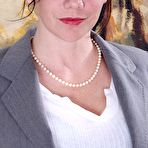 First pic of Glasses-wearing MILF takes off her teacher-like outfit on camera - IamXXX.com