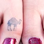 Fourth pic of Purple bikini Latina giving us a few extreme close-ups of her pussy - IamXXX.com