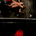 Third pic of Redhead domina Ariel X dressed in latex loves playing with girl slave Ariel X