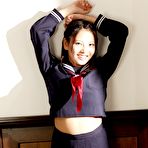 Third pic of Sex Av Idols - Anri Sakura posing her natural big tits outdoors in red dress