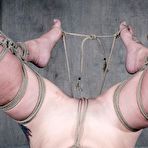 Second pic of SexPreviews - Tess Dagger is bound in rope and toyed to orgasm in dark dungeon