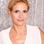 First pic of Huge tits MILF showing off her tatted-up pussy to the viewer - IamXXX.com