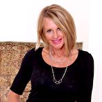 First pic of Black lingerie short-haired blonde MILF shows her juicy pussy - IamXXX.com