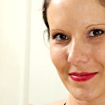 First pic of Dark-haired MILF with natural breasts and a black dress shows her body - IamXXX.com