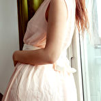 First pic of Ponytailed beauty with a perky booty posing and drinking tea - aMetart.com