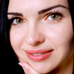 Fourth pic of Enchanting brunette beauty Lilian Aura slowly strips her two-tone lingerie and jazzy stripy holdups