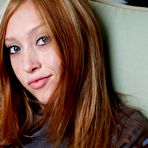 Third pic of Bratty redhead Dina Nubiles strips her white panty showing her tight pink pussy