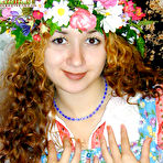 Third pic of Russian hottie with a tight body stripping her ethnic dress and spreading her pussy (preview pictures)