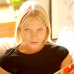 First pic of Beauty milf blonde Abigail Toyne relaxing in her black clothes on the sofa