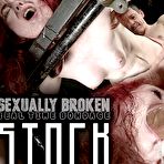 First pic of SexPreviews - Penny Lay redhead is bound in wooden stock and fucked by maledom Jesse Dean