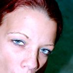 Second pic of Blue eyed redhead Brandie May with round boobs and smooth pussy sucks from your perspective