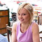 First pic of Glasses-wearing blonde in purple reads magazines and gets naked - aMetart.com