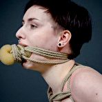 Second pic of SexPreviews - Kitty Dorian black stockings brunette is bound in lots of rope in bdsm dungeon