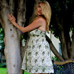 Fourth pic of Shoeless blonde Kelly Space in nice summer dress shows off her lovely feet outdoors