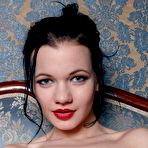 Fourth pic of Pale-skinned brunette beauty spreading her pussy lips on a sofa - IamXXX.com