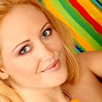 Second pic of Blond-haired and blue-eyed bombshell showing that juicy slit of hers - IamXXX.com