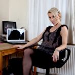 First pic of Blue-eyed housewife stripping down to her black see-through lingerie - IamXXX.com