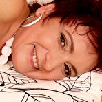 Fourth pic of Curly-haired grandma showing her fat, wrinkly and leathery body on cam - IamXXX.com