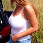 First pic of Ines exposes her big tits while having her wet white shirt on