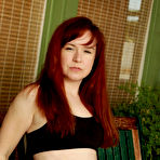 Second pic of [All Over 30] Redhead Annabelle Lee yanks her wet panties to the side - IWantMature.com