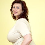 First pic of [Mature NL] Solo cloathed mature mom releases her monster natural tits and plays with a dildo - IWantMature.com