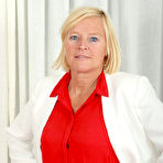 First pic of [All Over 30] Blonde executive Sabine spreading her hairy pussy wide - IWantMature.com