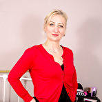 First pic of [Mature NL] Naughty blonde housewife Lilith in leather skirt playing with her pink sex dildo - IWantMature.com