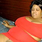 Third pic of Big Red is a super-sized Mature Mama ready to blow you mind and anything else you've got